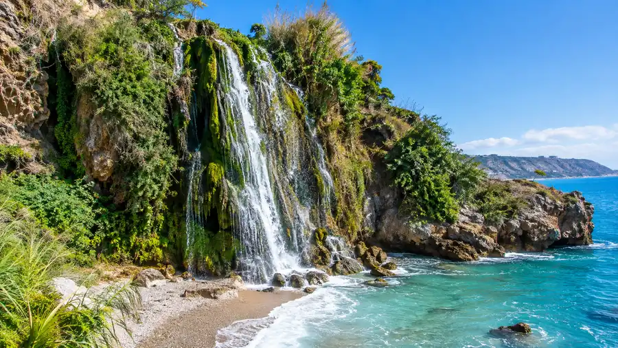How to Get to Playa de Maro: Parking, Bus, and Directions