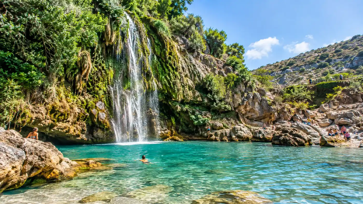 How to Get to Playa de Maro: Parking, Bus, and Directions